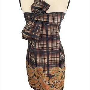 Worth strapless dress with bow and paisley accent. Size 8.